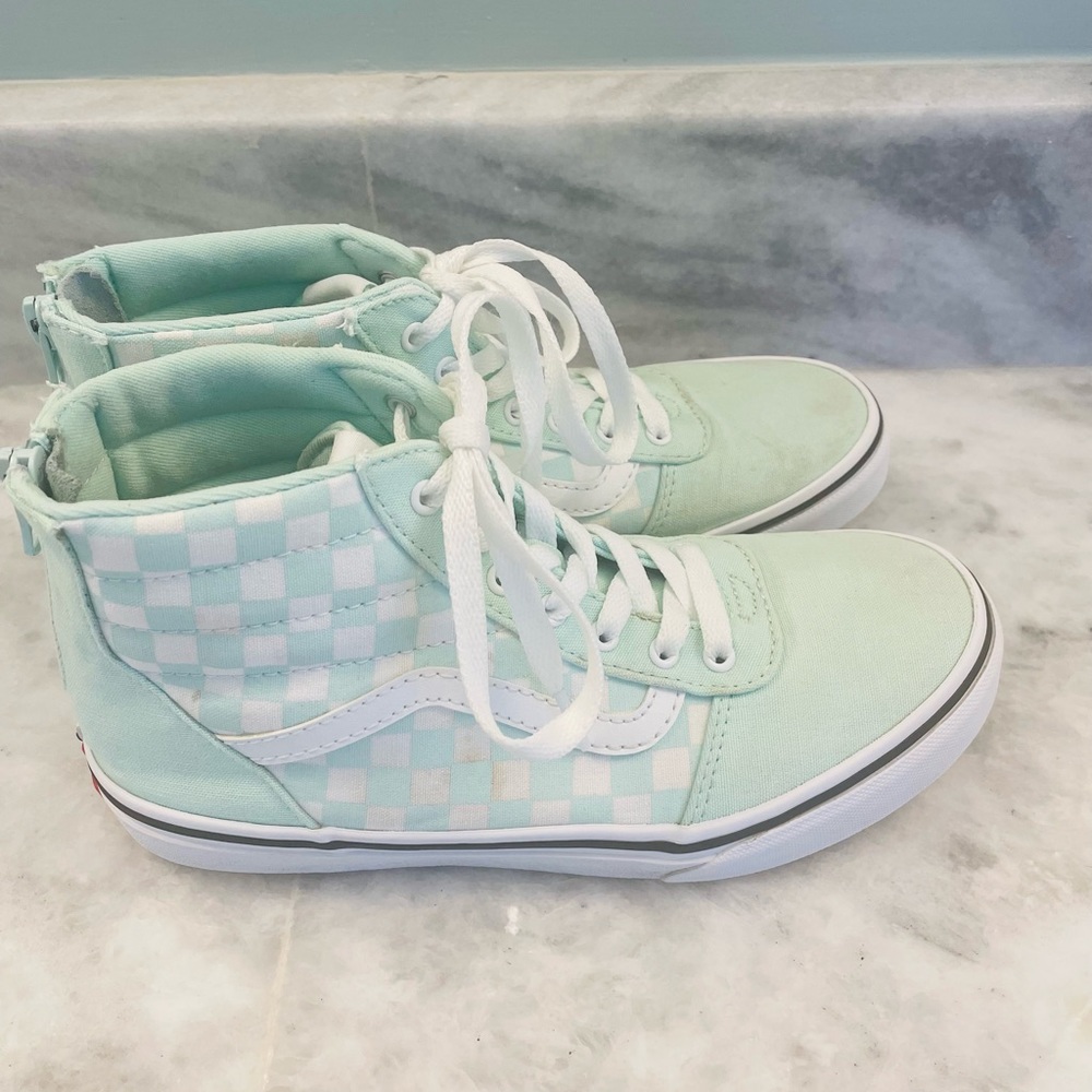 Mint green Vans high tops